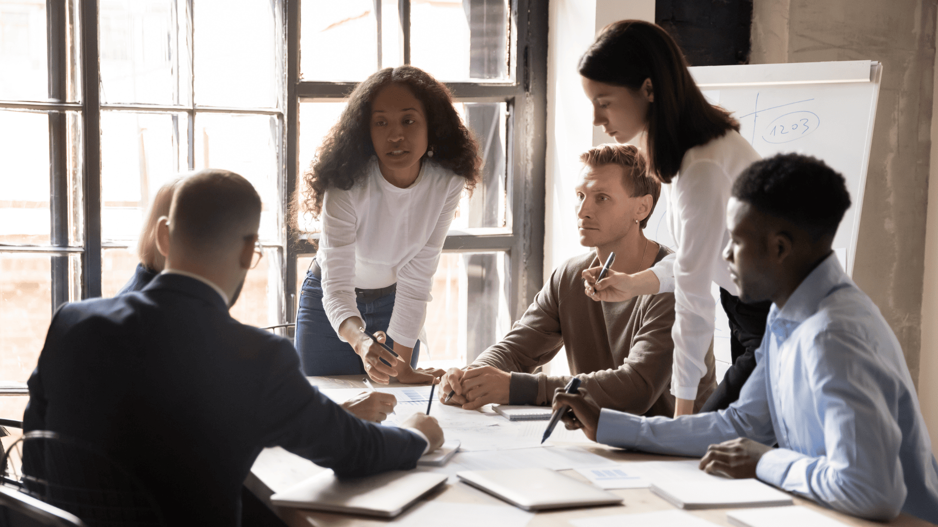 sales leaders working at conference table